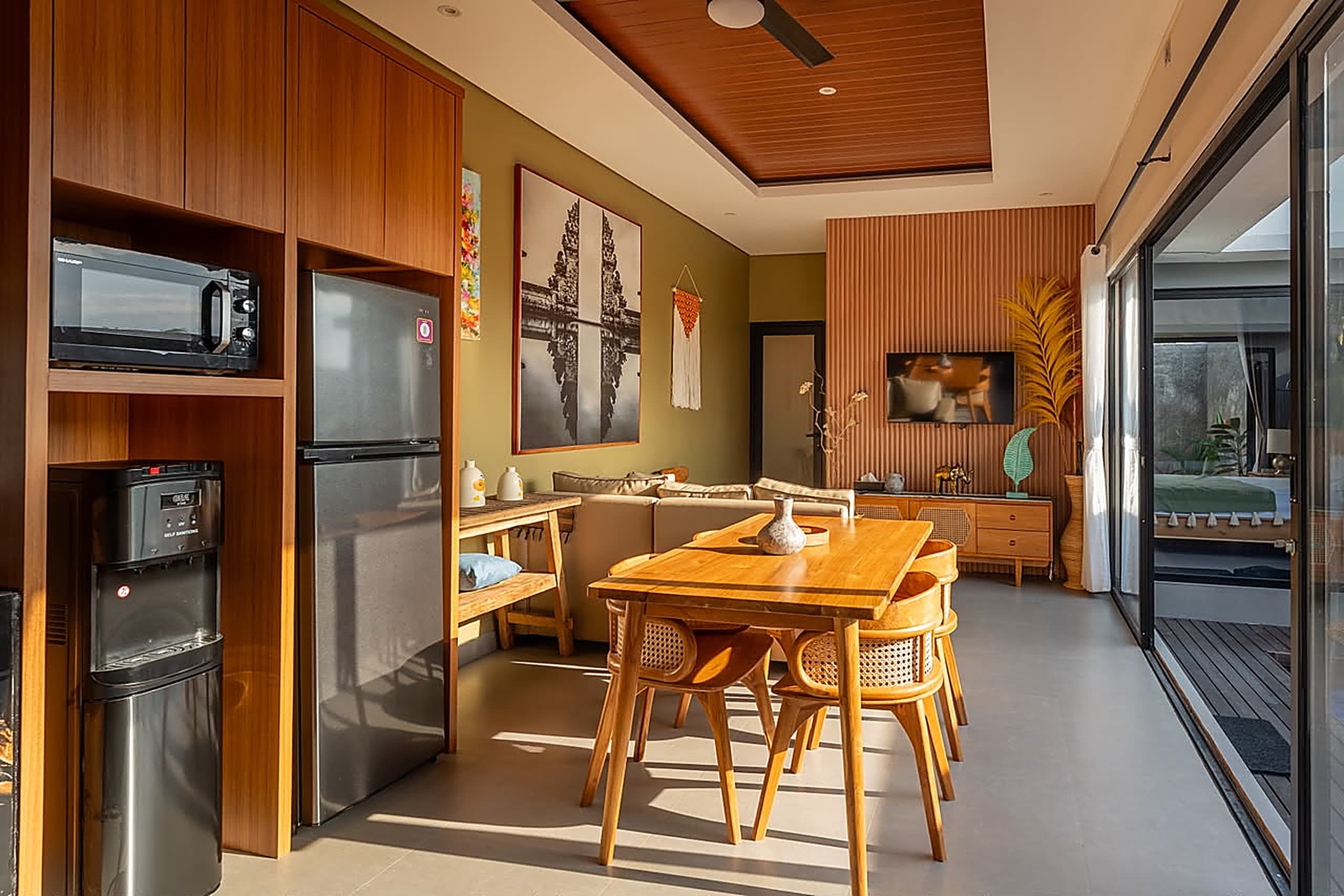 Kitchen and dining pavilion with teak furnishings